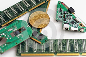 close-up of gold bitcoin on computer components background, technology and digital currency concept