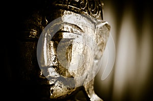 Close-up of a wooden buddha figure photo