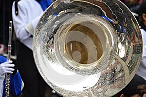 Close up of Golden Brass Horn with rain drops on a Brass Band