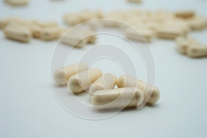 Close-up from golden capsules, medicines