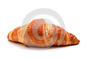 Close-up of golden croissant on white background. French pastry