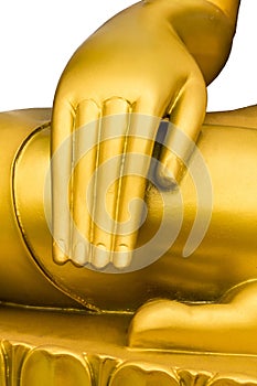 Close up golden hand of buddha statue.