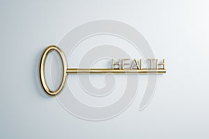 Close up of golden key to health on white background. Creative concept.