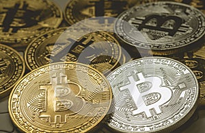 Close Up Golden and silver Bitcoin, Selective Focused on jigsaw ground. Electronic Money And Finance Concept