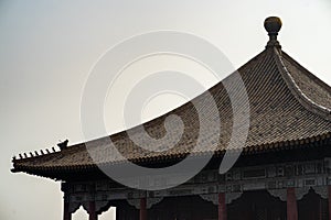 Close-up of the golden tiles detail of the rooftops of The Forbidden City, Beijing, China