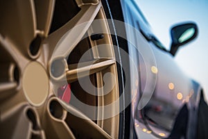 Close Up Of Golden Tire Rim Of Exotic Car