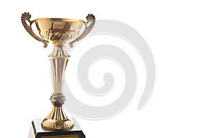 Close up of golden trophy isolated on white background. Winning awards with copy space.