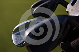 Close up golf bag on course