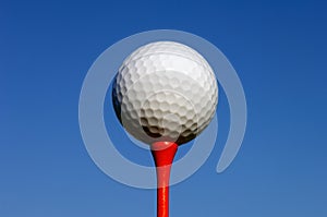 Close up of a golf ball on a tee