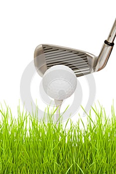 Close up of a golf club with ball and tee