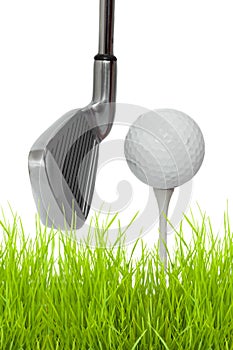 Close up of a golf club with ball and tee