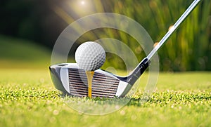 Close-up of golf club ready to hit ball from golf tee