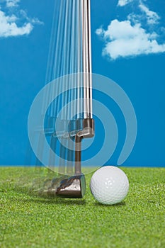 Close up of a golfer's putter