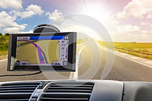 Close-up of gps navigation system device in travelling car