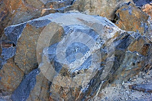 Close-up of granite rock. Natural stone wall background