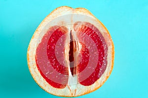 Close up grapefruit on a blue background