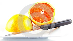 Red grapefruit cut in half