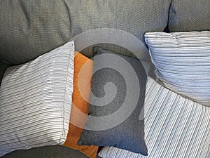 Close up gray fabric couch Sofa with colorful backrest pillows, comfortable, relax, rest, cozy, homy style, photo