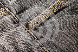 Close-up gray jeans detail