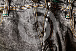 Close-up gray jeans detail