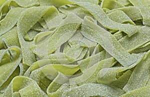 Close up of green apple flavored sugar coated candy strips