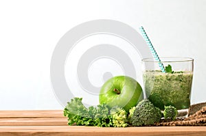 close up a green apple with mixed green vegetable and green juice for healthy organic green food concept