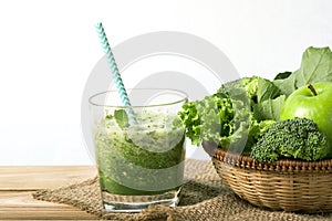 close up a green apple with mixed green vegetable and green juice for healthy organic green food concept