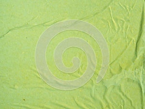 close up green crumpled paper background. High quality beautiful photo concept