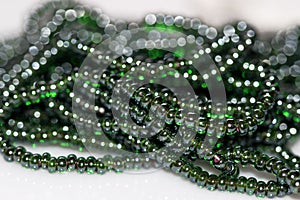 Close up of green jewel or gem - emrald type