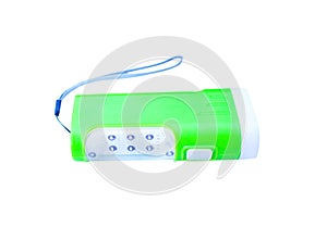 Green plastic flashlight with white edge in horizontal isolated on white background with clipping path