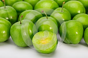 Close Up Of Green Plums Or Greengage showing the flesh and the s