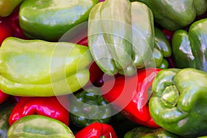 Close up on green and red bell peppers