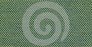 Close-up of green stitched with yellow threads. Green texture background.