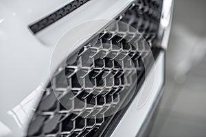 Close up of a grey car bumber