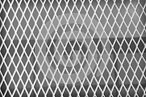 Grey metal mesh texture in seamless patterns on background