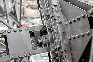 Close-up grey painted steel iron construcion frame beam of old giant ferris wheel in Prater amusement park in Vienna. Industrial
