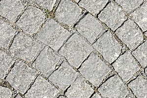 Close-up of grey stone sidewalk