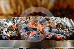 Close Up of Grill With Food Cooking Over Flames