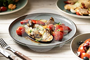 Close-up of grilled vegetables on a blue plate. keto diet and healthy eating concept.