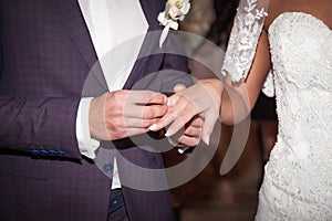 Close up Groom Put the Wedding Ring on bride