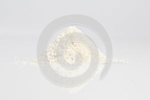 close up of grounded coconut flakes, coconut isolated on white background