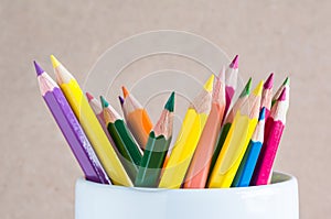 Close-up A group of color pencils in a white cup