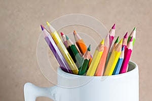 Close-up A group of color pencils in a white cup