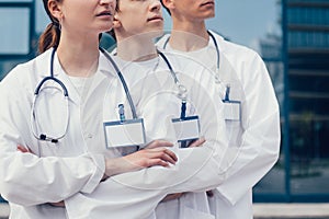 Close up. group of confident medical professionals standing in a row.