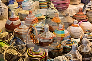 Close Up of Group of Demijohn Wrapped with Colored Cotton