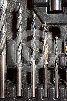 Close-up of a group of drill bits for drilling holes