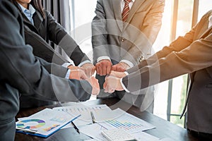 Close-up of group hand success business people person working together in office. Diversity of businessman and businesswoman