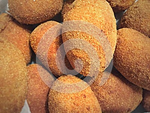 Close up of a group of Italian supplÃÂ¬, traditional fried rice balls