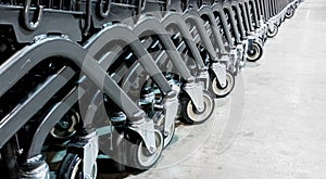 Close-up group of shopping cart wheels. selective focus.