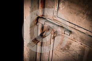 Close up:grunge metal old rusty door hinge,.